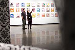 Students look at art in gallery